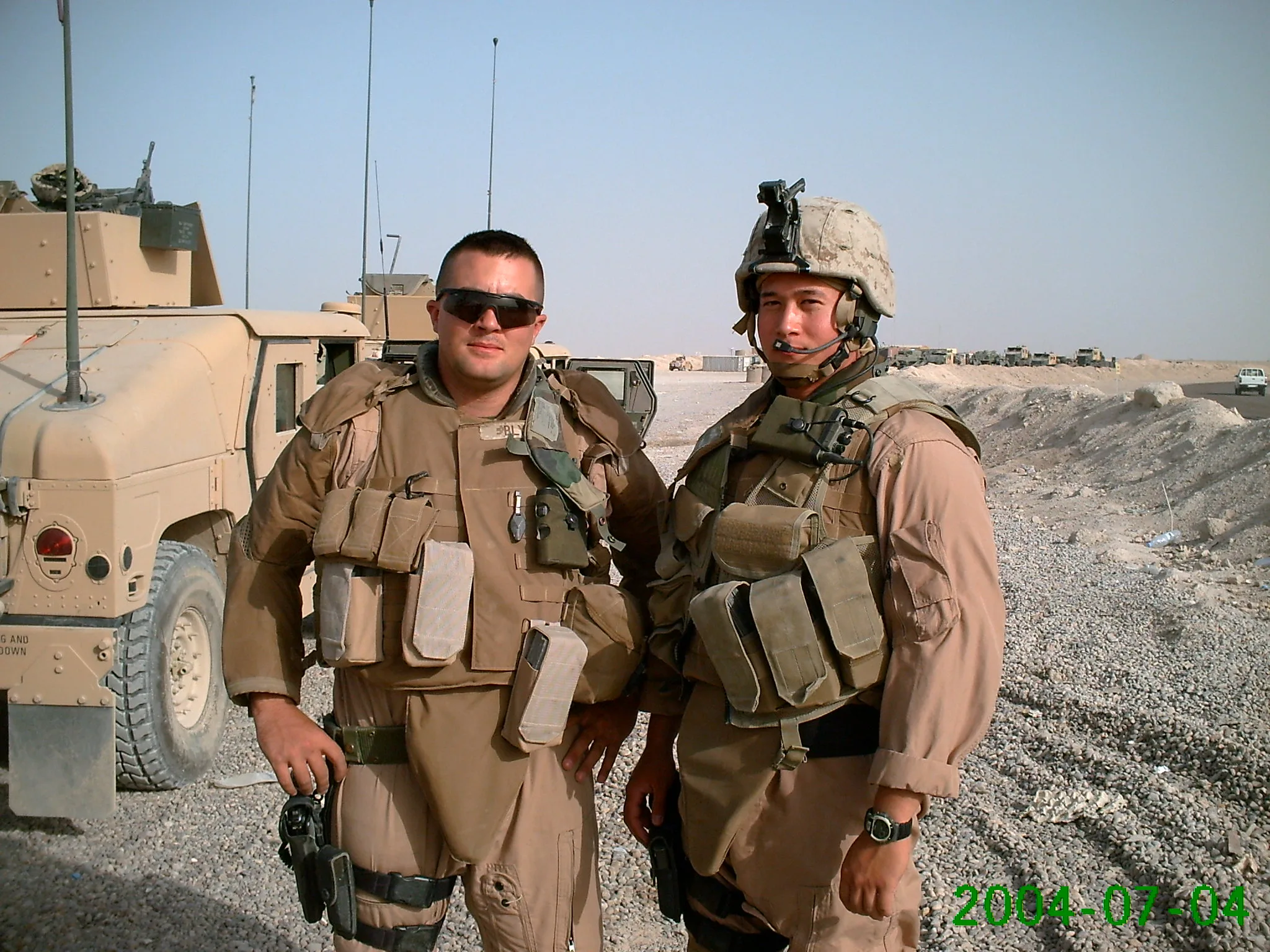 Two service members in the field, representing the Post community PostGuard protects